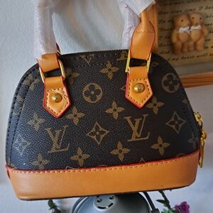 Louis Vuitton Brown Monogram Mini Handbag-Faux